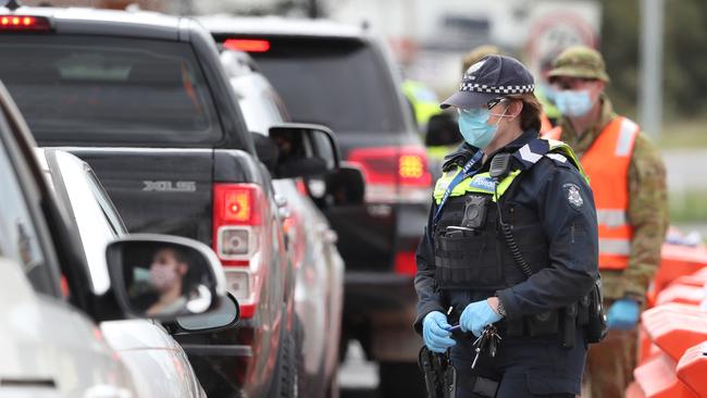 A COVID-19 roadblock on the Hume Highway as regional Victoria eases restrictions and Melbourne, along with Mornington Peninsula, remains in Stage 4 lockdown. Picture: David Crosling