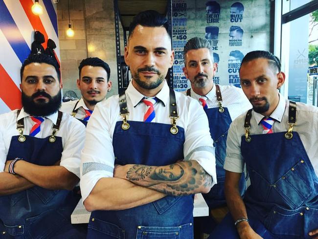 Dapper Gents Barber Shop owner Goran Gulevski (centre) had a complaint alleging gender discrimination after refusing to cut a woman’s hair.