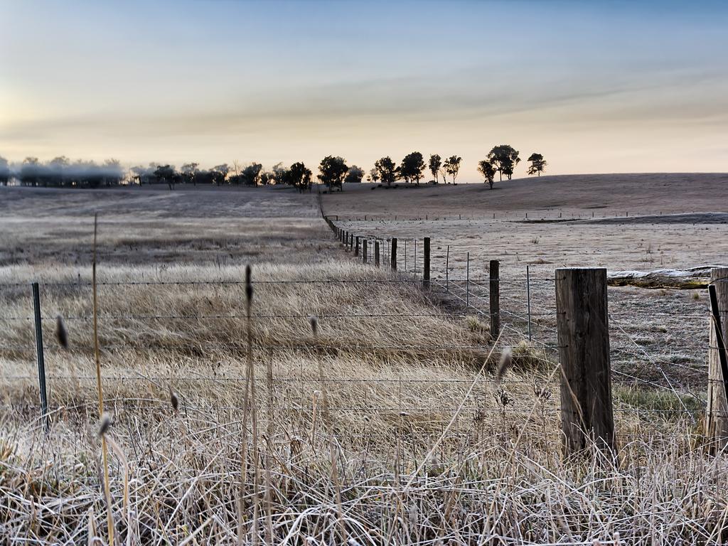 Agricultural farm in Australia during winter season with frost on wires of paddock fence at sunrise. (Photo: File)