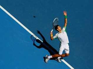 Novak Djokovic of Serbia serves in his first round match against Paul-Henri Mathieu of France during day one of the 2013 Australian Open at Melbourne Park on January 14, 2013 in Melbourne, Australia. . Picture: Scott Barbour / Getty Images 