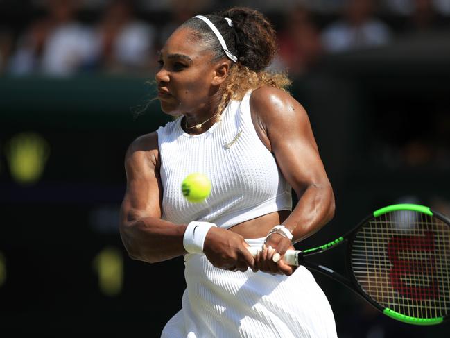 US player Serena Williams returns against Czech Republic's Barbora Strycova during their women's singles semi-final match on day ten of the 2019 Wimbledon Championships at The All England Lawn Tennis Club in Wimbledon, southwest London, on July 11, 2019. (Photo by Adam DAVY / POOL / AFP) / RESTRICTED TO EDITORIAL USE