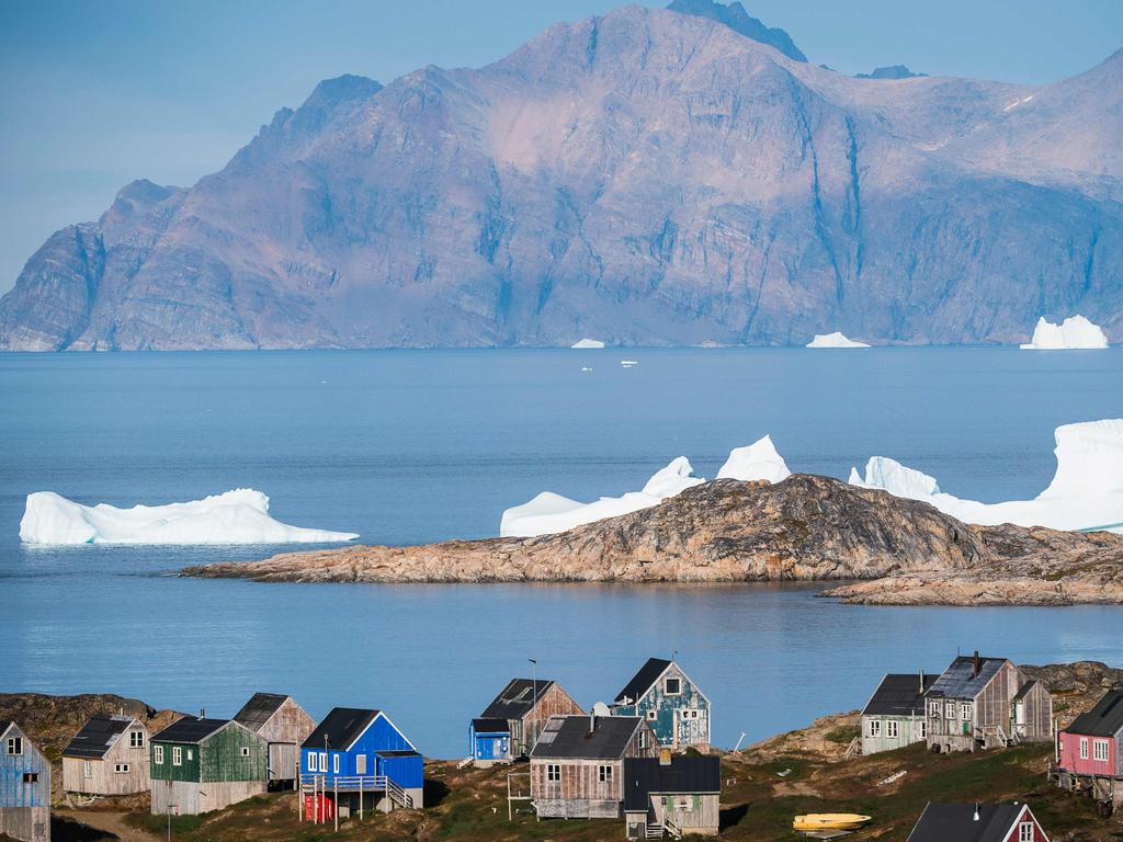 Icebergs float behind the town of Kulusuk in Greenland on August 16, 2019. Picture: AFP