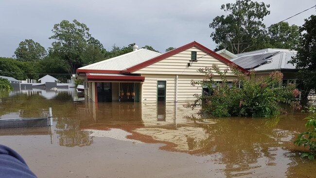 A young Brisbane couple finally moved into the house of their dreams, only to watch it flood not even six months after settlement. Photo: contributed.