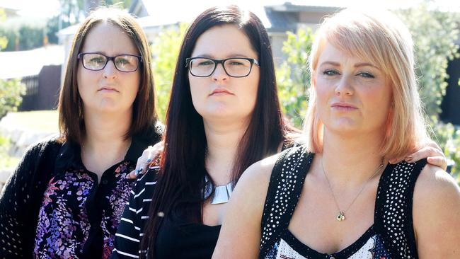 Glenda Brinckman, Melissa Lawton and Amanda Lawnton are the daughters of Bob and Cathy Lawton, who were travelling with their friends Rodney and Mary Burrows on MH370. Picture: Liam Kidston