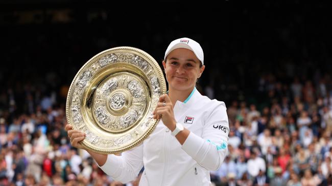 Ash Barty with the Venus Rosewater Dish trophy after winning her Ladies' Singles Final match against Karolina Pliskova. Picture: Clive Brunskill/Getty Images