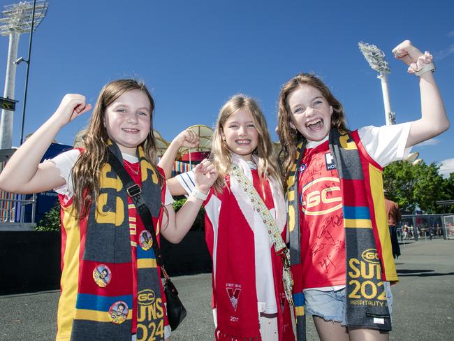 Mia Hawkins (9), Charlotte Cziesche (8), and Charli Hawkins (11) before the Gold Coast Swans take on the Sydney Swans at People First Stadium, Carrara. Picture: Glen Campbell