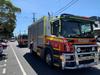 Crews battle roadside blaze after car explodes