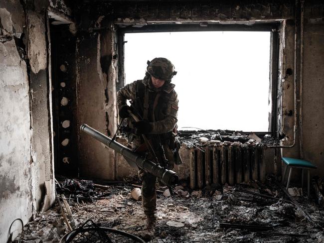 A Ukrainian serviceman of the State Border Guard Service works in a position in Bakhmut. Picture: AFP