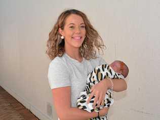 TOUCH AND GO: Lacee Buzza with daughter Zia. Picture: Meg Bolton