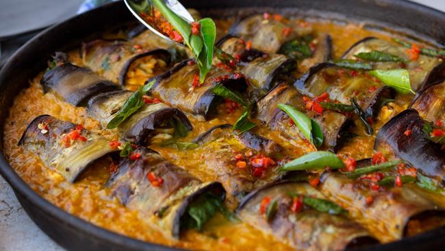 Stuffed eggplant in curry. Picture: Jonathan Lovekin