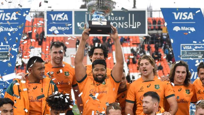 Australia's Wallabies celebrate with the trophy after defeating Argentina's Los Pumas 41-26 last weekend.