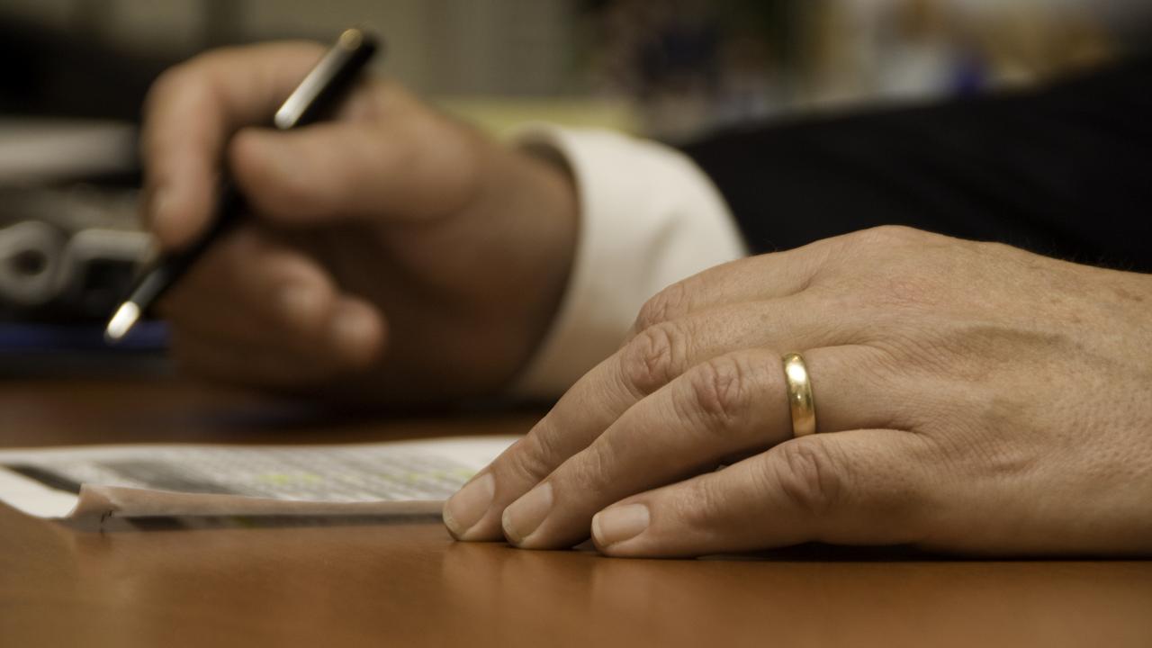 A shiny wedding ring suggests the couple checking in are newly married and, hopefully, deserving of a free upgrade.