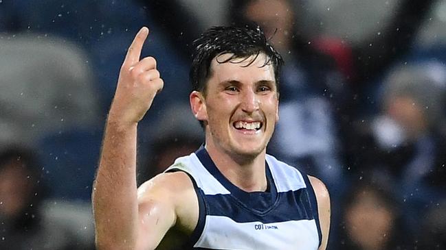 Charlie Constable celebrates a goal during Geelong’s emphatic win over Melbourne on Saturday night. Picture: Getty Images. 