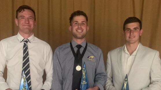 Charlie Riggs (middle) was awarded the Mail Medal in the North Eastern Football League last year. Picture: North Eastern Football League