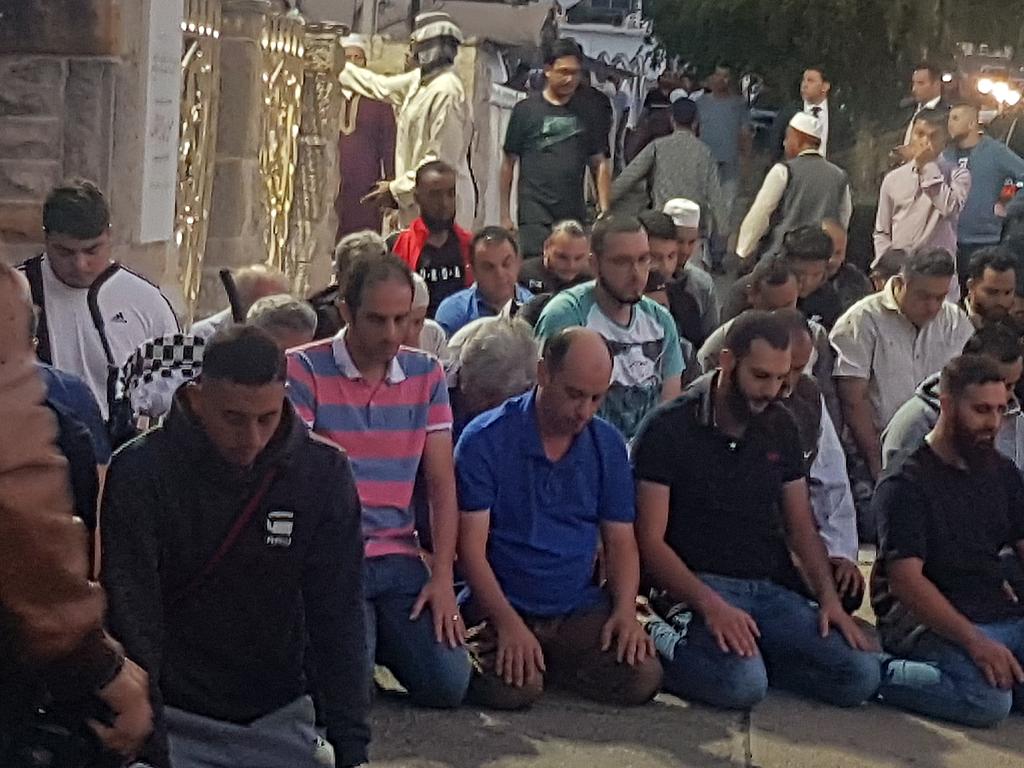 Worshippers pray for victims and families of the Christchurch shootings during an evening vigil a the Lakemba Mosque in Lakemba, New South Wales, Australia. Picture: AP