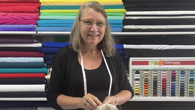 Cairns dressmaker Beverley Lannan at her Edge Hill business said it's a joy to help clients feel fabulous by ensuring their clothes fit perfectly. Picture: Alison Paterson