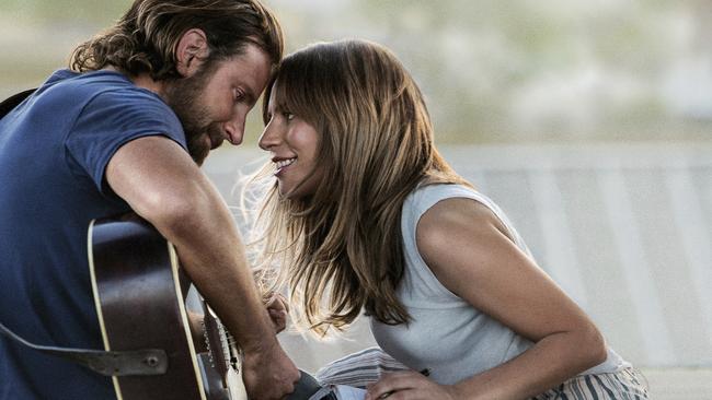This image released by Warner Bros. Pictures shows Bradley Cooper, left, and Lady Gaga in a scene from 