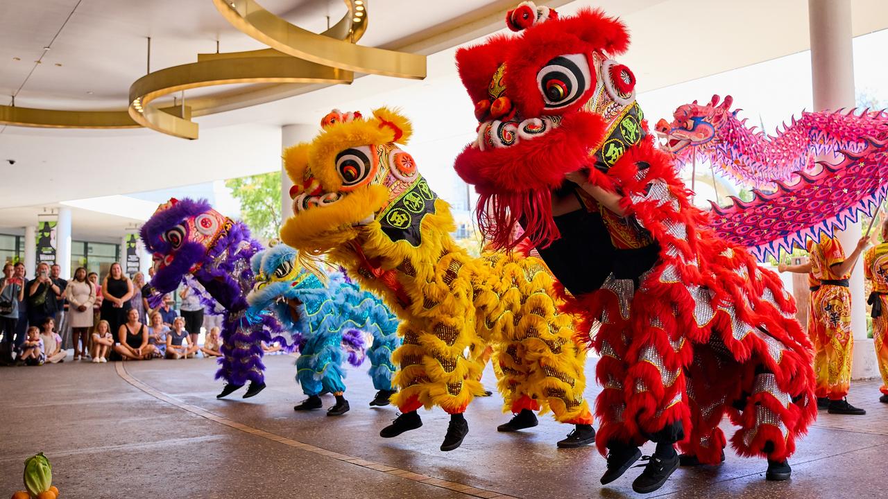 Traditional Chinese dragon dances greeting visitors to the Crown Perth casino.