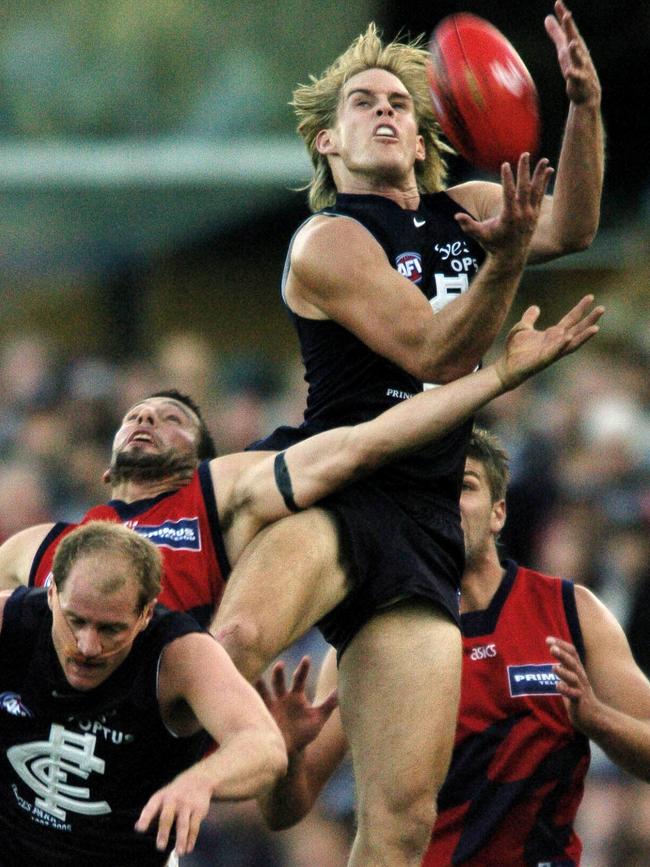 David Teague flies for a mark as a Blue.