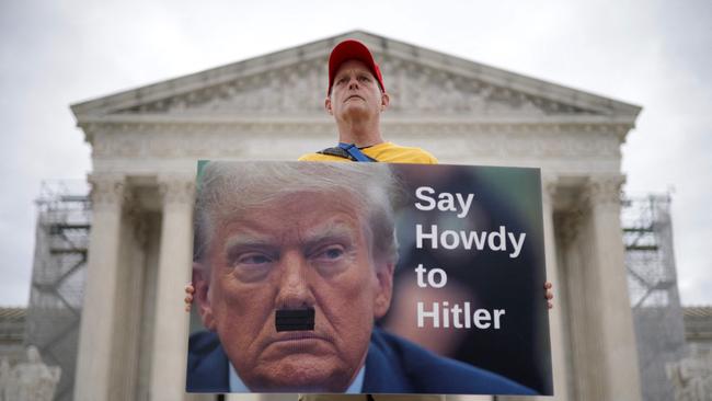 An entirely level-headed and not at all hyperbolic protest against Donald Trump outside the Supreme Court in Washington, DC. Picture: Getty Images