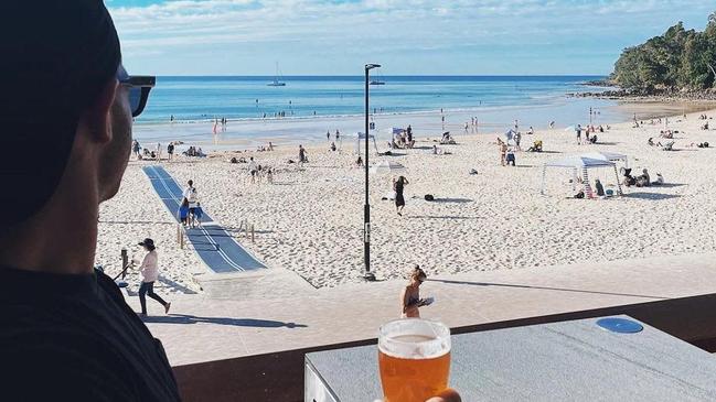 Taylor Adams getting some sun and a quiet beverage in Noosa.