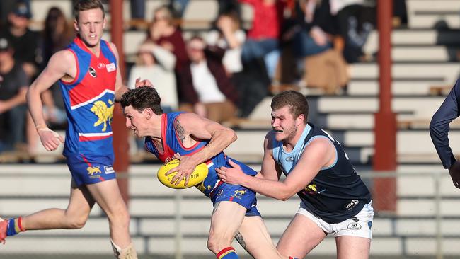 Southern Football League grand final 2019. Lindisfarne V Huonville at North Hobart Oval. Brody Rundell Huonville and Dylan Johns Lindisfarne. Picture: NIKKI DAVIS-JONES