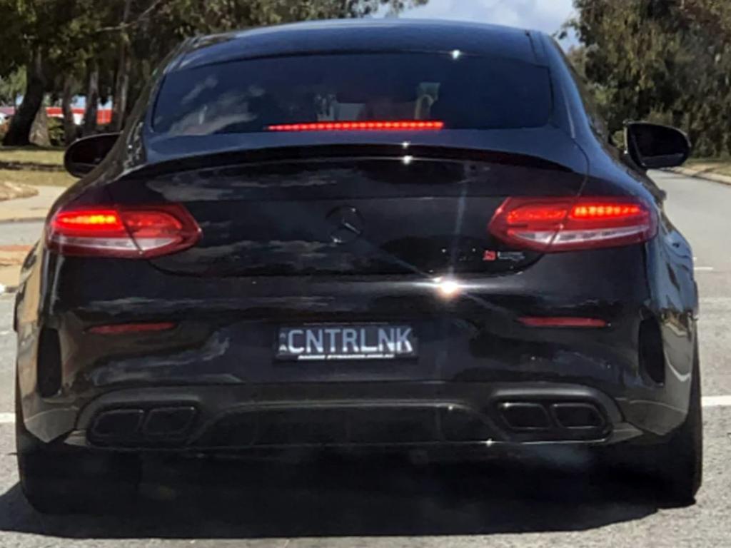 A driver in Western Australia has sparked debate on social media over the 'tasteless' choice of number plate affixed to their luxury European car. Picture: Reddit