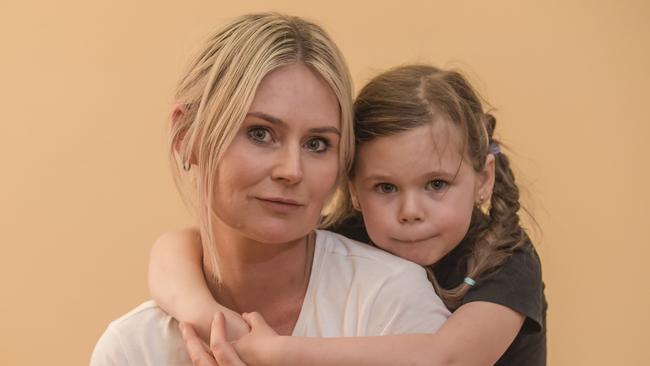 Alisha Toy and her daughter Stevie, 5, were turned back after flying from Adelaide to Perth to see their family for the first time since January. Picture: Roy VanDerVegt