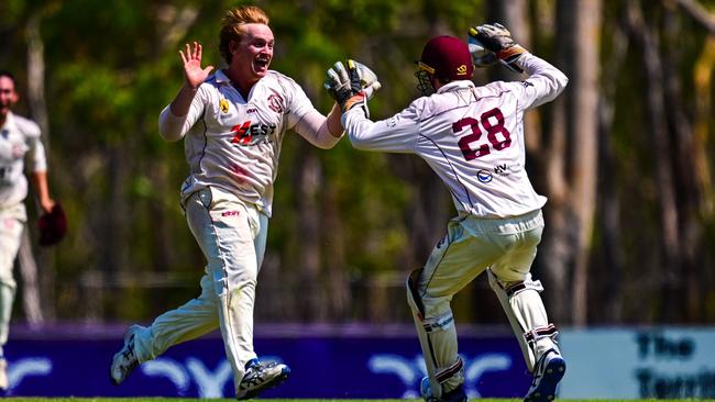 Palmerston captain Hamish Martin (left) celebrating a wicket during the A-grade DDCC grand final against Waratah. Picture: Cricket NT.