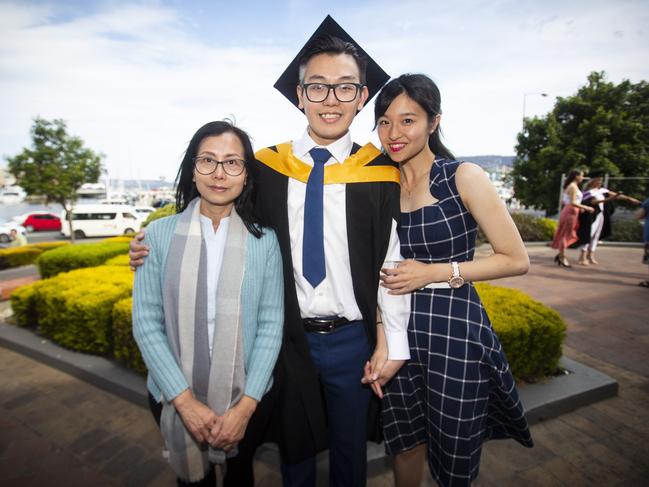 Pharmacy graduate Heiyin Ning and family at UTAS graduations held at the Hobart Grand Chancellor. Picture: LUKE BOWDEN