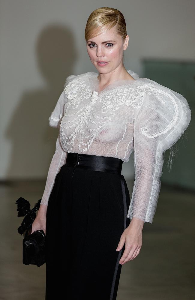 Melissa George daring the bare a breath at the Convivio 2014 Dinner Gala in Milan.