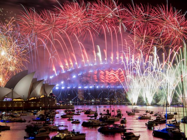 Fireworks explode over the Sydney Harbour during New Year's Eve celebrations in Sydney, Tuesday, January 1, 2019. (AAP Image/Brendan Esposito) NO ARCHIVING