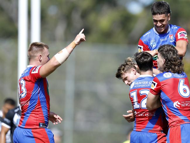 The Knights celebrate a try. Picture: Michael Gorton