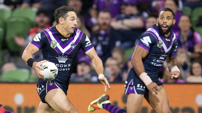 Mate against mate ... Storm teammates Billy Slater (left) and Josh Addo-Car will be on opposing sides in today’s second State of Origin. Photo: Michael Klein