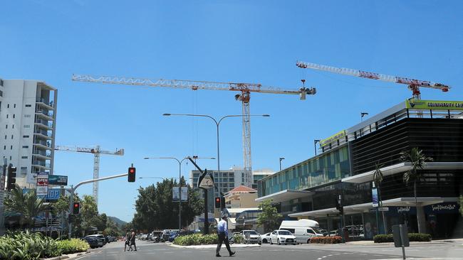 High cranes work on a two-tower apartment and hotel project. Picture: Justin Brierty