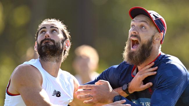 MELBOURNE, AUSTRALIA – MARCH 17: Brodie Grundy and Max Gawn of the Demons compete in the ruck during a Melbourne Demons AFL training session at Gosch's Paddock on March 17, 2023 in Melbourne, Australia. (Photo by Morgan Hancock/Getty Images)