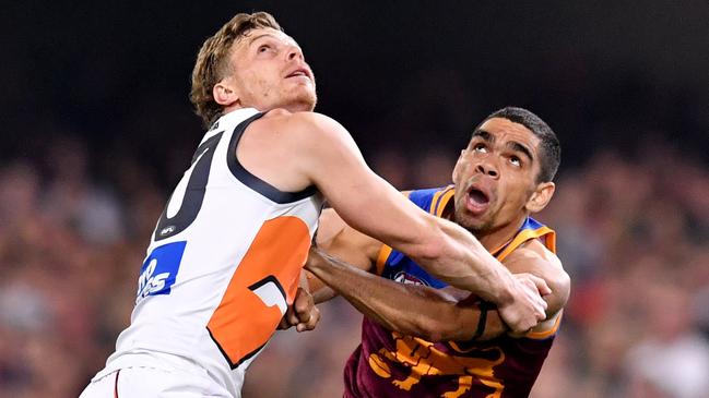 Adam Kennedy was warned to stop hitting Charlie Cameron’s elbow by umpire Shaun Ryan. Picture: AAP Image/Darren England.