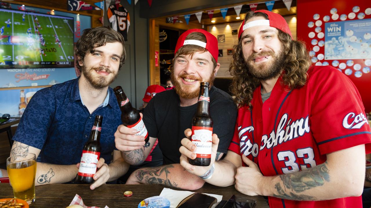 Watching the NFL Super Bowl at Tailgate Sports Bar are (from left) Harrison Fischle, Sean Mac and Ziggy Hansen, Monday, February 14, 2022. Picture: Kevin Farmer