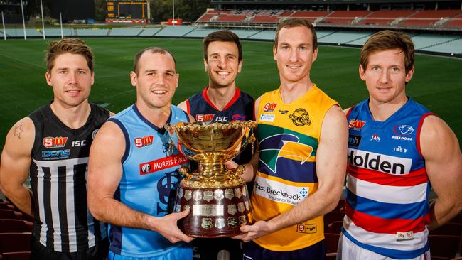 SANFL captains (left-to-right) Steven Summerton Port Adelaide, Zane Kirkwood Sturt, Matt Panos Norwood, Patrick Giuffreda Woodville-West Torrens, Trent Goodrem, Central District. Picture: AAPImage/James Elsby).