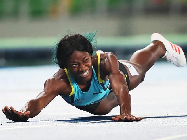 Shaunae Miller of the Bahamas makes a desperate dive for Gold in the Women's 400m Final just beating American Allyson Felix during the Athletics at the Olympic Stadium on Day 10 of the Rio 2016 Olympic Games. Picture. Phil Hillyard