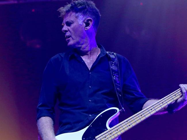 Midnight Oil bassist Bones Hillman performs with the band at the Derwent Entertainment Centre. Picture: PATRICK GEE