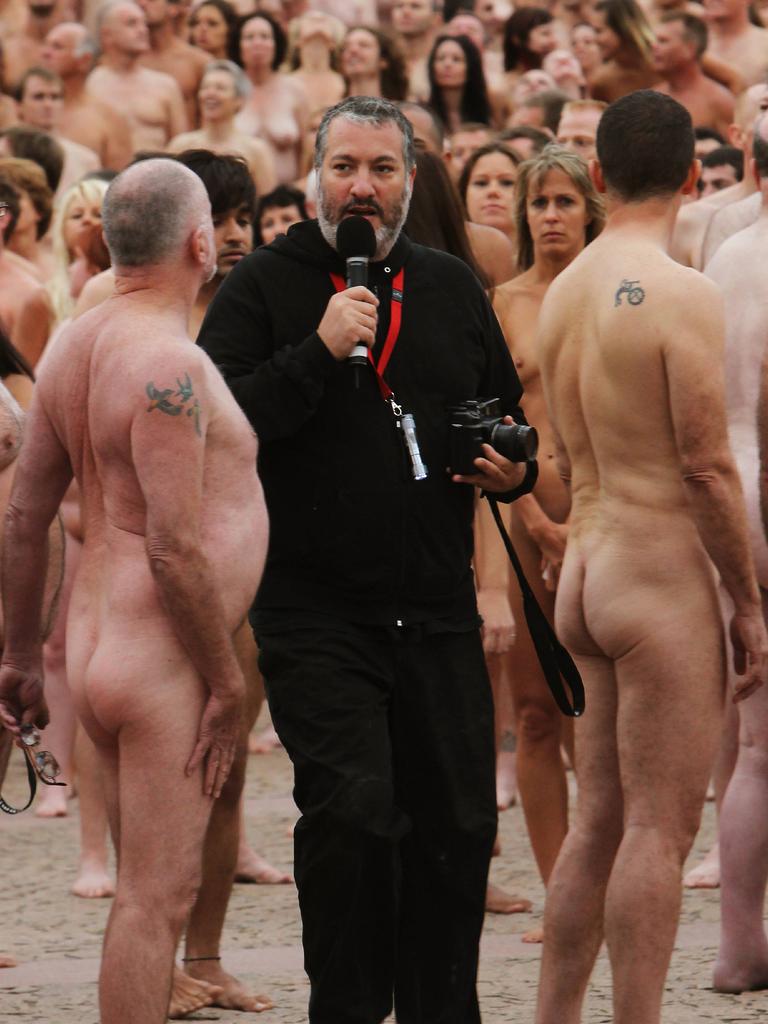 Tunick directs the masses outside Sydney Opera House in 2010.