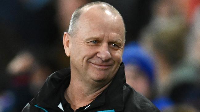 MELBOURNE, AUSTRALIA - JUNE 09: Power head coach Ken Hinkley smiles after winning the round 13 AFL match between Western Bulldogs and Port Adelaide Power at Marvel Stadium, on June 09, 2023, in Melbourne, Australia. (Photo by Quinn Rooney/Getty Images)