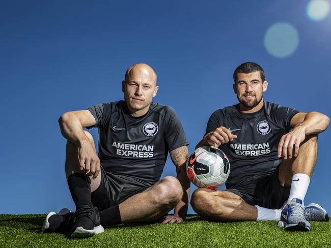 Former Brighton teammates Aaron Mooy (left) and Mat Ryan are suffering from a lack of club football. Picture: Hollie Adams / News Corp Australia