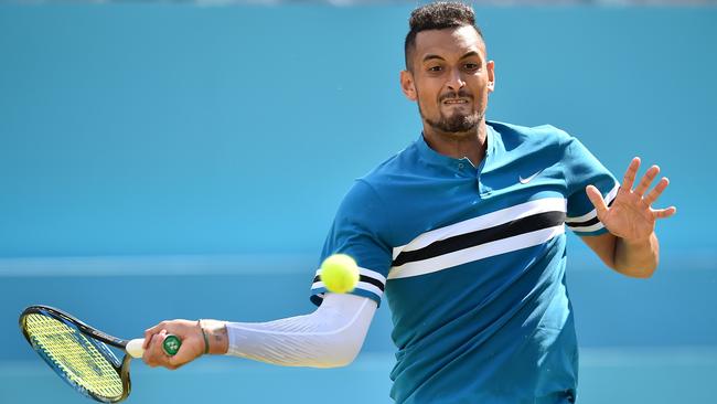 Nick Kyrgios was in flamboyant form against Britain’s Kyle Edmund at Queen’s. Picture: AFP