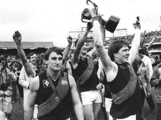 Shane Heard and Bill Duckworth with the premiership cup in 1984.