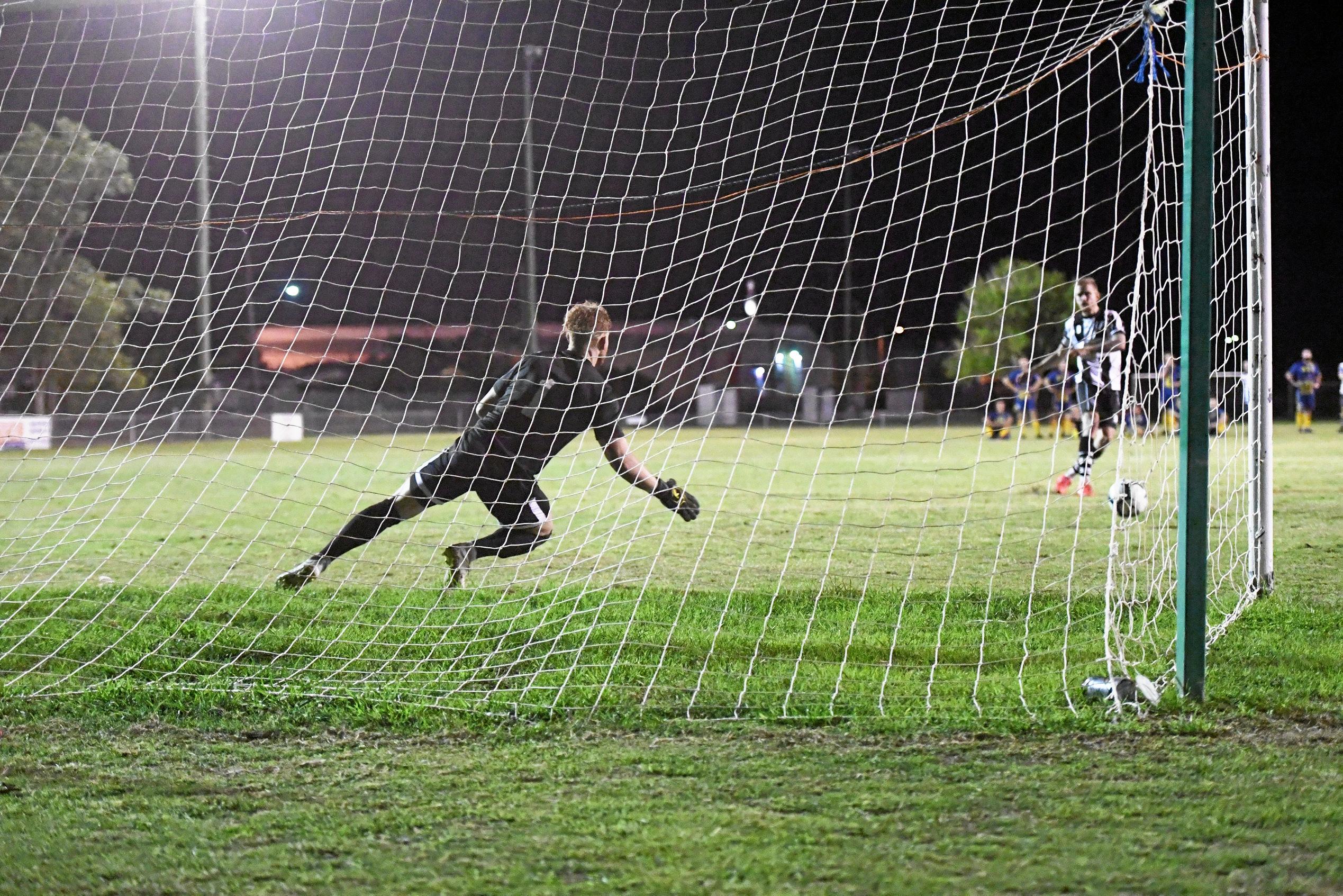 Bingera captain Daniel Watson shoots his penalty wide. Picture: Shane Jones