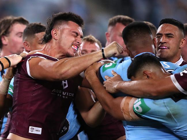 Tino Fa'asuamaleaui of the Maroons and Payne Haas of the Blues scuffle in 2020. Picture: Mark Kolbe/Getty Images