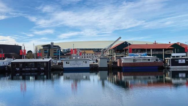 An artist's impression supplied by the state government showing the visual impact of the proposed Macquarie Point stadium when looking across the Hobart waterfront towards Hunter St