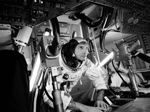 Apollo 11 Command Module (CM) pilot Mike Collins practising docking hatch removal in a simulator prior to the mission. Credit: NASA